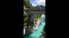 Thrilling leap: daring dive from Napoleon's Bridge, Slovenia