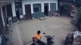 Tricycle drives away by itself as man tries to carry out repairs