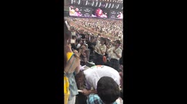 Crowd celebrates girl's birthday at university event