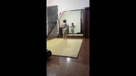 Enthusiastic Chinese boy impresses with vibrant locking dance performance