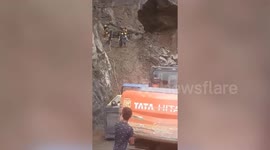 Dramatic landslide on highway in northern India workers narrowly escape