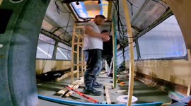 Family save £20k in two years by moving into a double-decker bus