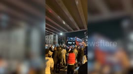 Excited England football fans swarm around bus headed to 'Bellingham'
