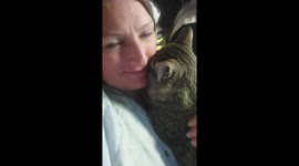 Mort snuggles and purrs