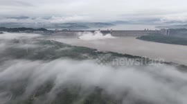 China: Time-lapse Footage Show Flood Released From The Three Gorges Dam at Sunset in Yichang