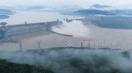 China: Flood Released From The Three Gorges Dam at Sunset in Yichang