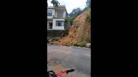 Landslide destroyed a TWO-story house in northern Vietnam