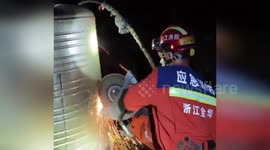 China: Firefighters Rescue Man Trapped in Water Tank in China