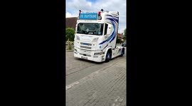 trucks honk in procession