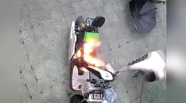 Electric motorcycle engulfed in flames as battery explodes