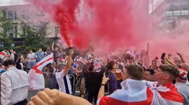 Fans go wild ahead of Euros final. England fans in Manchester Northern quarter