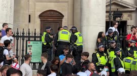 Police arresting English fans on the steps of St Martins Lane opposite Trafalar Square police are not messing around today - london England