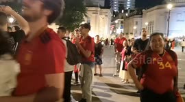 As Spanish football fans celebrate their win in Trafalgar Square a horrible English fan gets angry and starts to swear