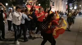 Spanish football fans celebrate the win over England by partying in Trafalgar Square
