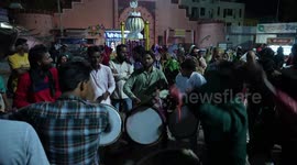 Muslim devotees offer Mehendi to Tazia before Muharram procession in India