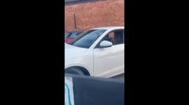 Football fans cheer as Grace navigates tight parking spot