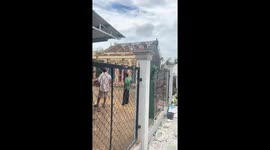 Tornadoes cause strong winds to blow away and destroy rows of roofs