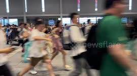 Chinese fanatics run in line to Anime exhibition