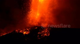 Stunning footage shows lava spewing from Mount Etna illuminating night sky