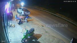 Pickup truck crashes in front of shop narrowly missing locals