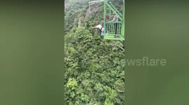 Bungee jumping for cowards with a gentle lowering downwards is a hit in China