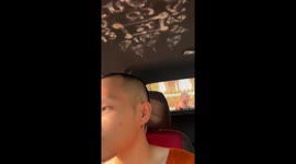 Buddhist monks topple over while riding on pickup truck