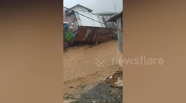 House collapses into flash flood as monsoon batters southern Philippines