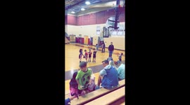 Tiny player's determination shines in his first basketball game