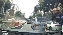 Shocking moment road collapses as cars pass in southern China