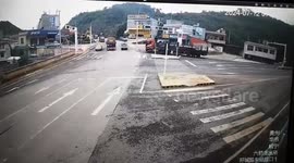 High-speed truck crash sends bus plunging down steep embankment in China