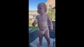 Love at first lick: Little girl discovers love for ice cream