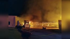 Italy: Firefighters Battle Blaze at Woodworking Company in Italy