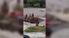Family rescued from swollen river in southern India amid heavy rains