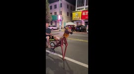 Chinese man leisurely rides an eye-catching 'bike horse' through streets