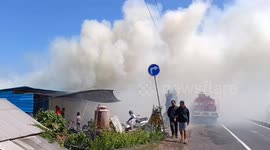 Firefighters battle to extinguish burning peatlands in tourist hotspot Bali