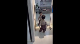 Toddler adorably dances in front of mirror