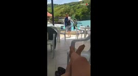 Man's unexpected poolside fall ends in laughter and fun