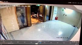 Boy luckily escapes serious injuries after running through glass door in China