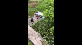 Villagers rescue family stuck in car that crashed into marshes