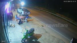 Lads leap sway from out-of-control pickup truck crashing towards them