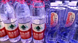 China: Bottled Water of Nongfu Spring and Ganten at a supermarket in Yichang
