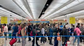 Overseas travellers enter China following expansion of visa-free policy