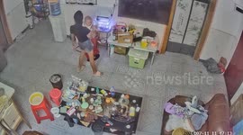 Stroller cushions baby's fall after sister's accidental drop in China