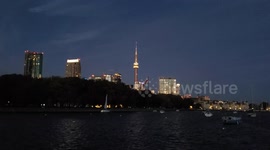 Beautiful views of CN Tower in Downtown Toronto at night from the lakeshore.
