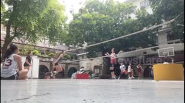 Volleyball player accidentally hits teammate’s head during combination play