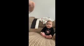 Tangles and tickles: Little girl's playtime puts mom's hair in peril