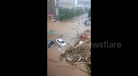 Flash floods from record-breaking rainfall kill 5 in northern China
