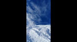snowboarder triple backflip
