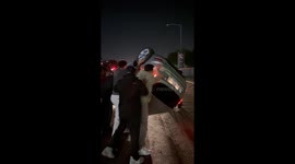 Hatfield Residents Push Flipped Car Back Over