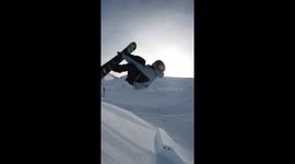 upclose shot, snowboarder massive triple backflip, HD